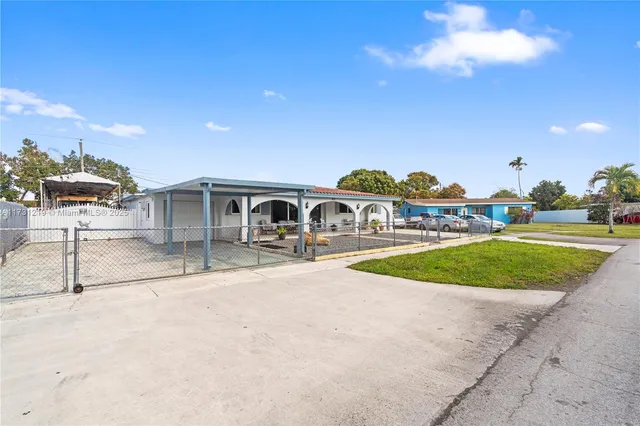 a view of a house with a swimming pool