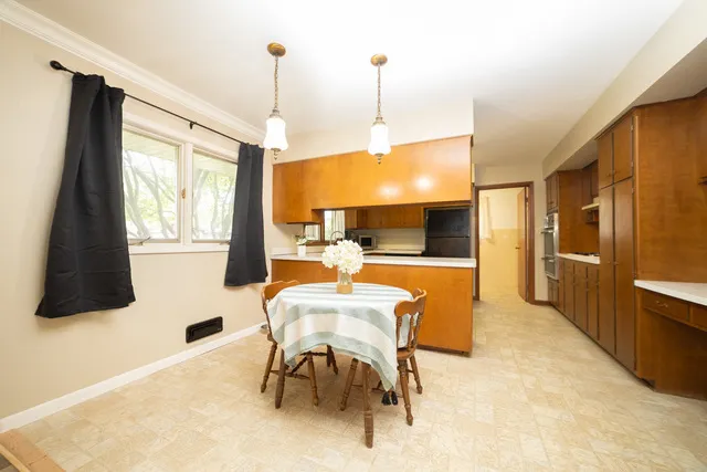 a kitchen with a sink and a window
