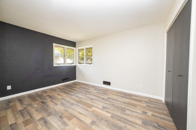 712 Homestead Place Joliet, IL 60435 - Photo 10 of 26 a view of an empty room with a window