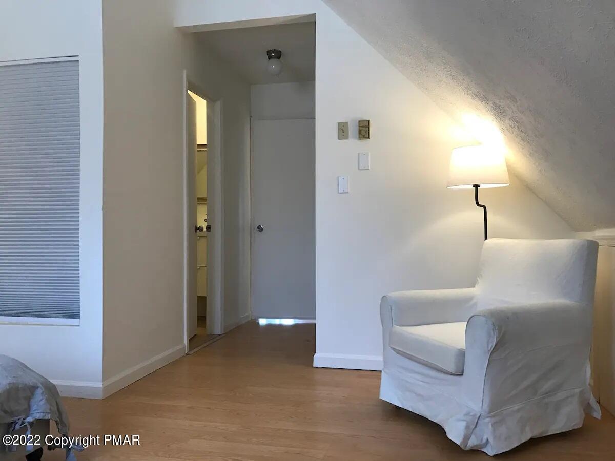 1421 Clover Road Long Pond, PA 18334 - Photo 16 of 31 a living room with furniture and a lamp