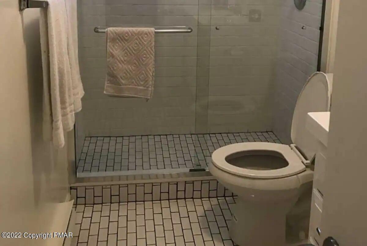 1421 Clover Road Long Pond, PA 18334 - Photo 22 of 31 a bathroom with a sink and a shower