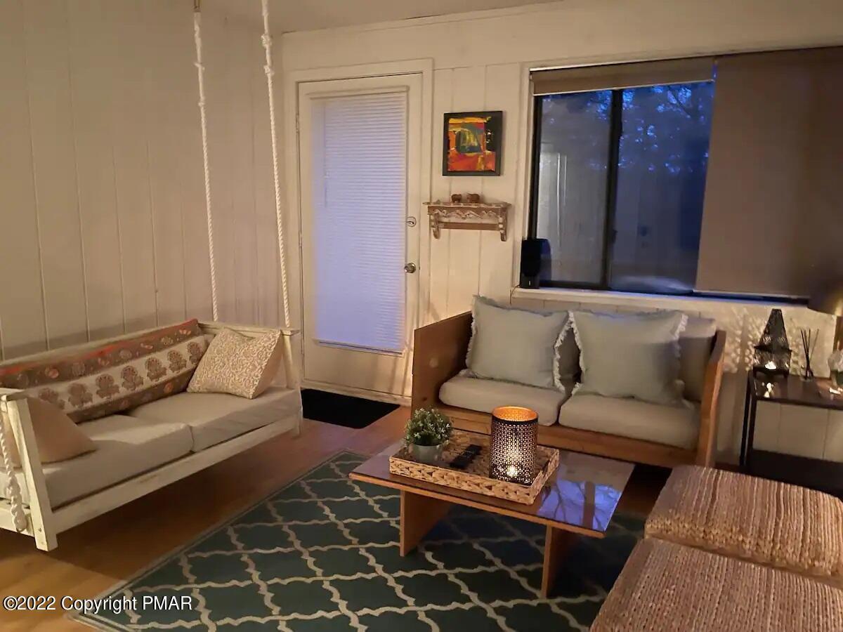 1421 Clover Road Long Pond, PA 18334 - Photo 5 of 31 a living room with furniture and wooden floor