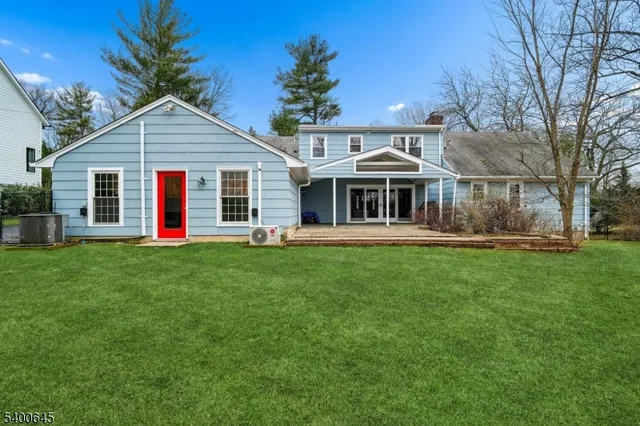 a view of outdoor space yard and front view of house