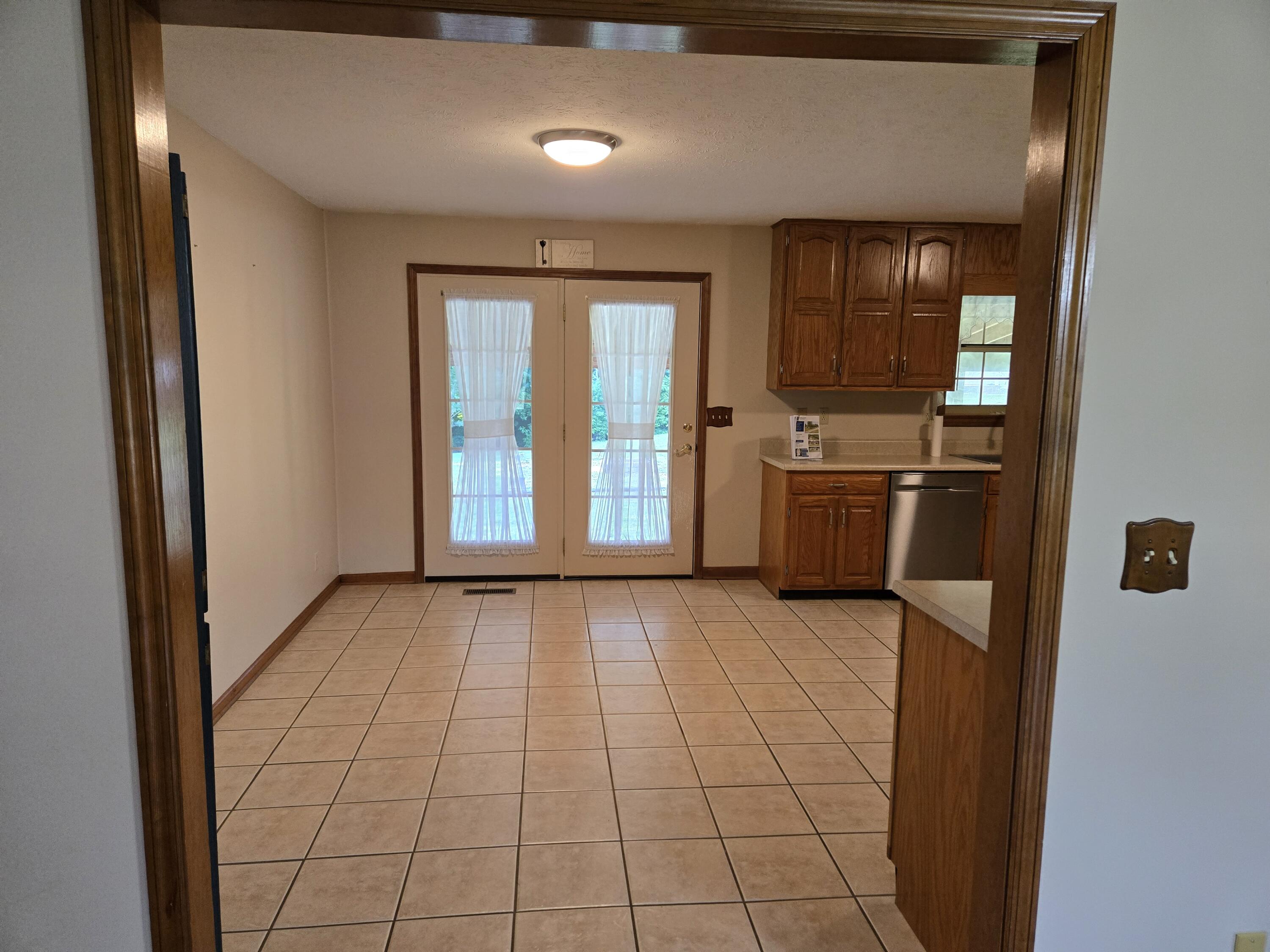 204 Old County Road Ringgold, GA 30736 - Photo 20 of 79 View from living room to kitchen.