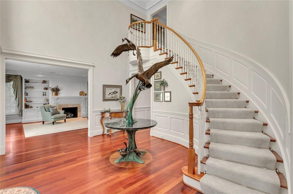 139 Peppergrass Road Baden, PA 15005 - Photo 14 of 50 This home features a spacious entrywaywith an elegant staircase, hardwood flooring, and architectural details.