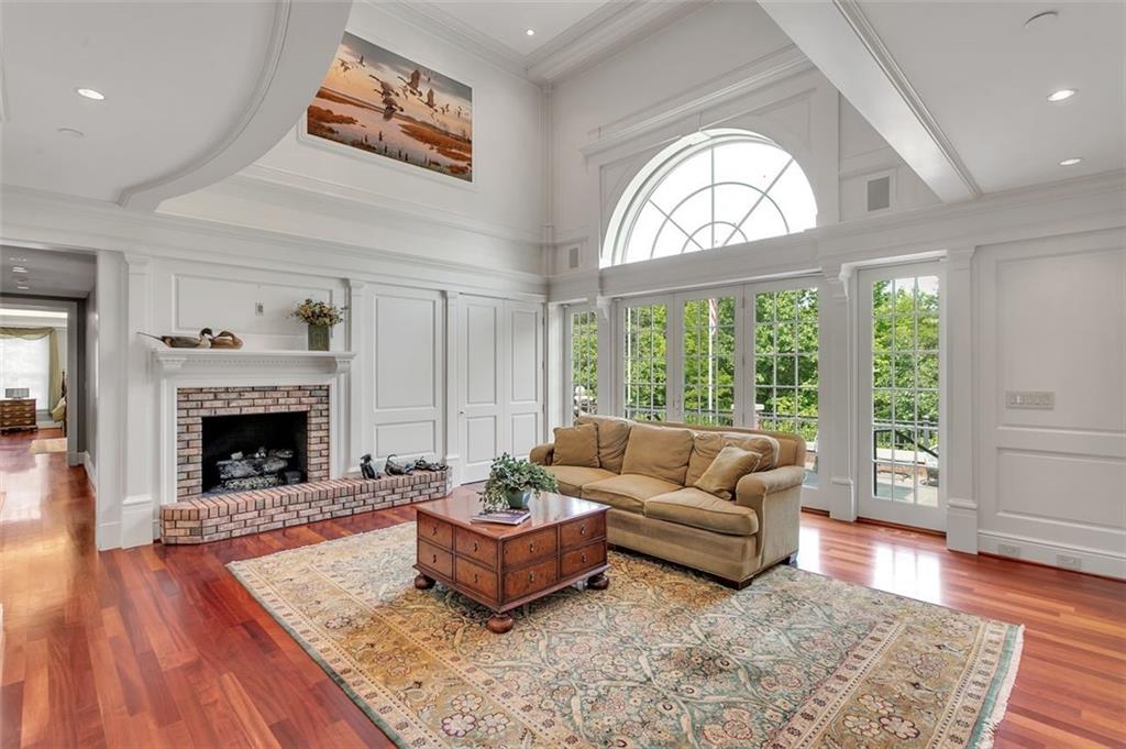 139 Peppergrass Road Baden, PA 15005 - Photo 15 of 50 The 2 story great room includes a wet bar and access to the custom stone patio.