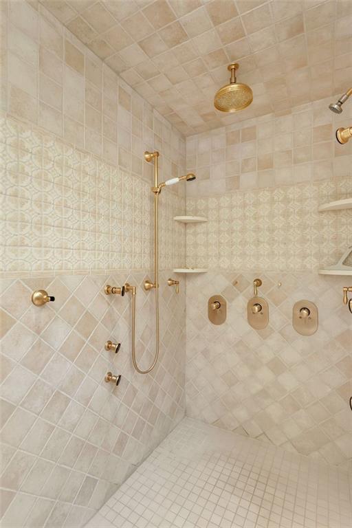 139 Peppergrass Road Baden, PA 15005 - Photo 28 of 50 Beautifully tiled primary bath shower emits a timeless look.