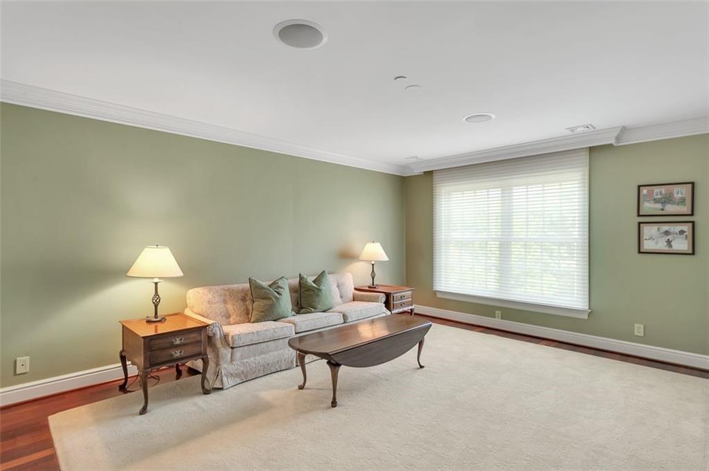 139 Peppergrass Road Baden, PA 15005 - Photo 33 of 50 The guest suite includes a bright living room with custom built-ins.