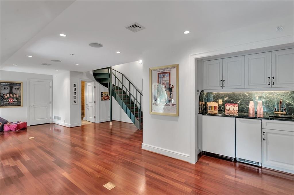 139 Peppergrass Road Baden, PA 15005 - Photo 41 of 50 In the 3rd level bonus you'll find a kitchenette for refreshments and a staircase leading to the rooftop overlook.