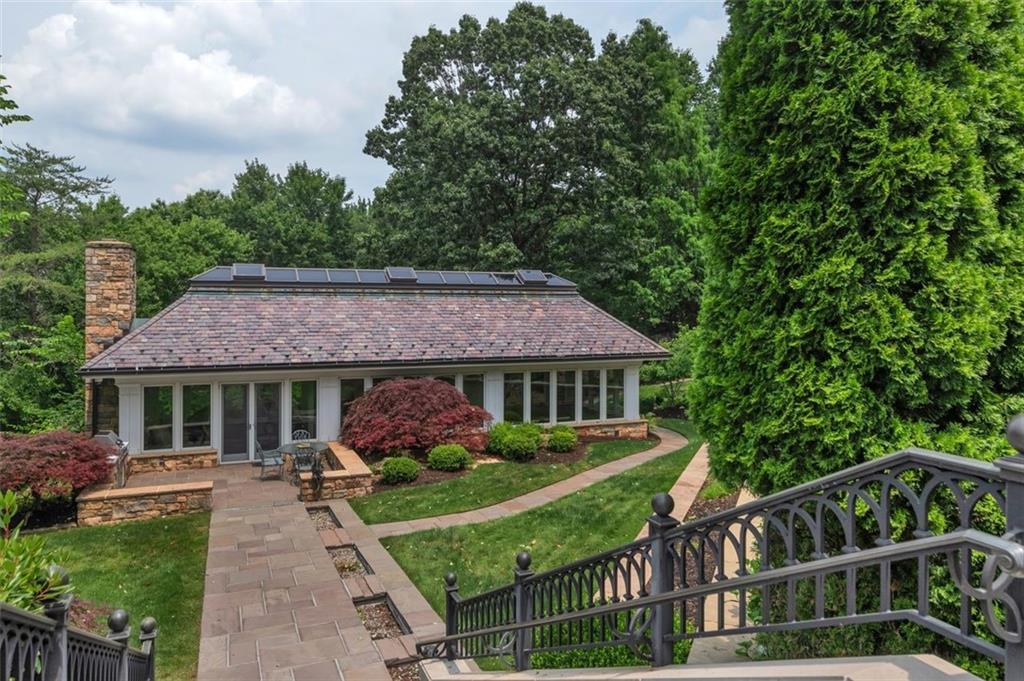 139 Peppergrass Road Baden, PA 15005 - Photo 10 of 50 The spa house offers a hot tub, kitchenette, fireplace, and full bath. A Viking grill sits outside the spa house.