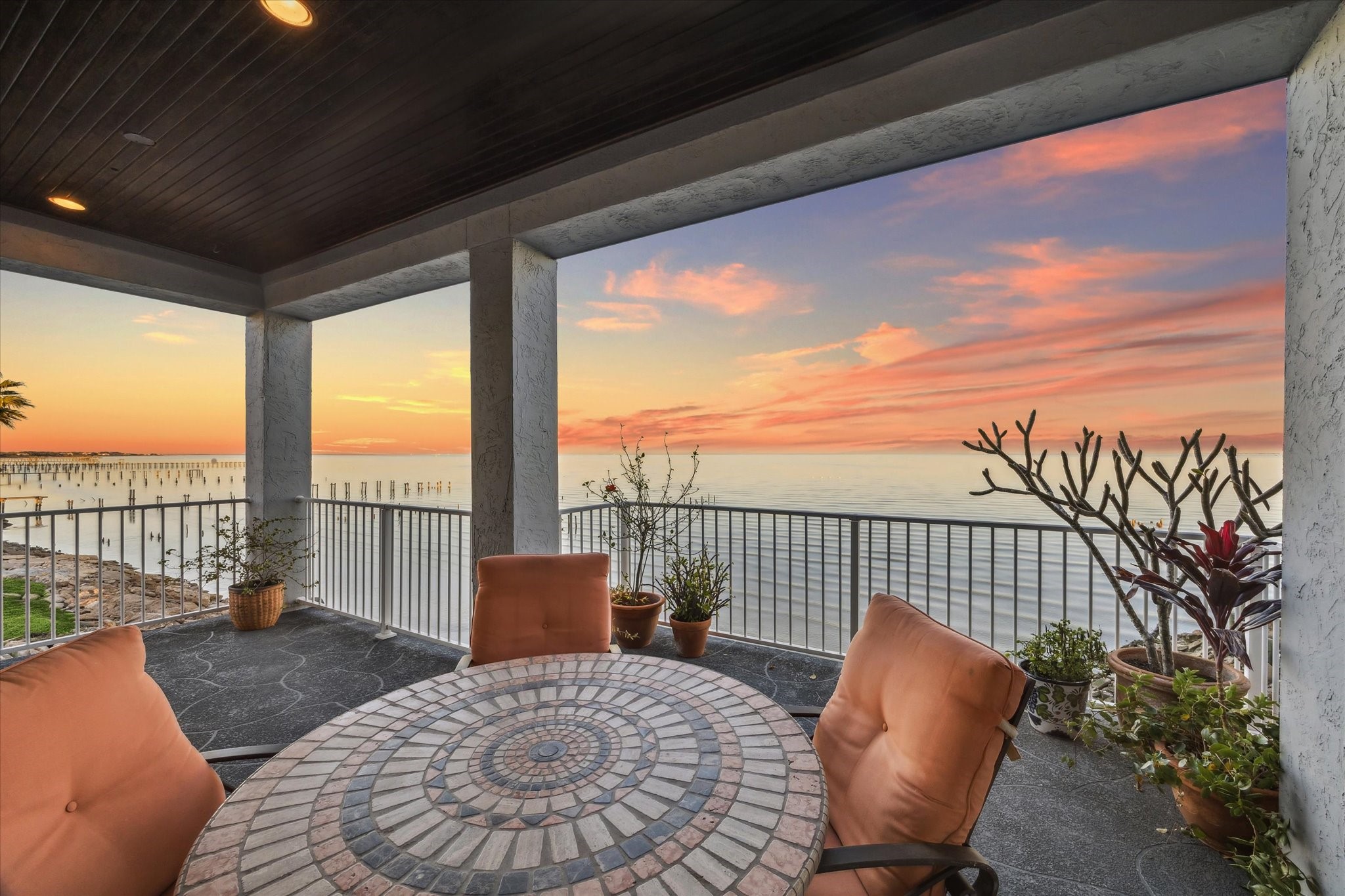 1406 Todville Road Seabrook, TX 77586 - Photo 18 of 50 THE LARGE BALCONY FEATURES PLENTY OF SPACE TO RELAX OR ENJOY BAYFRONT DINING.
