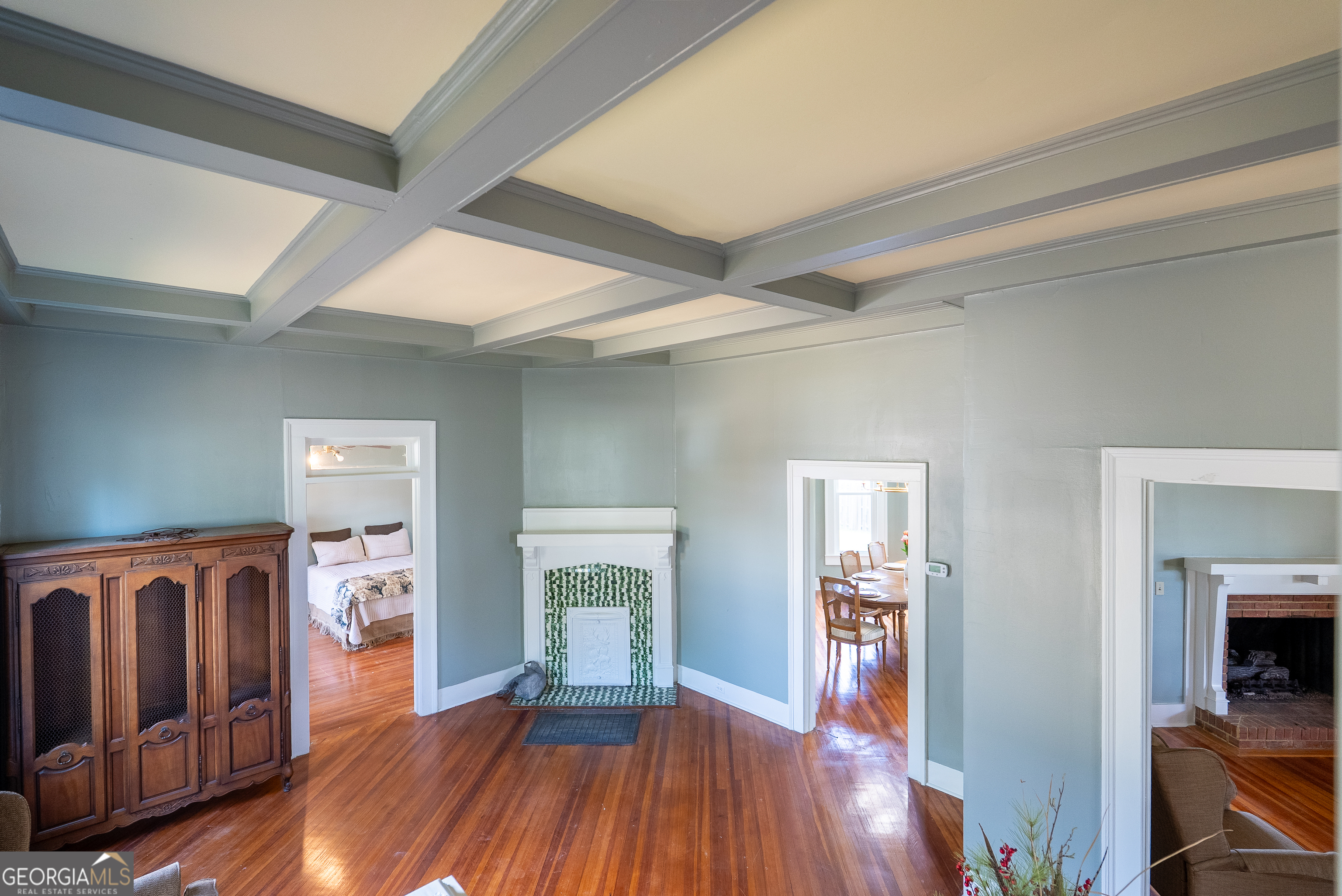 212 Hand Avenue West Pelham, GA 31779 - Photo 19 of 81 a view of a hallway with wooden floor and livingroom