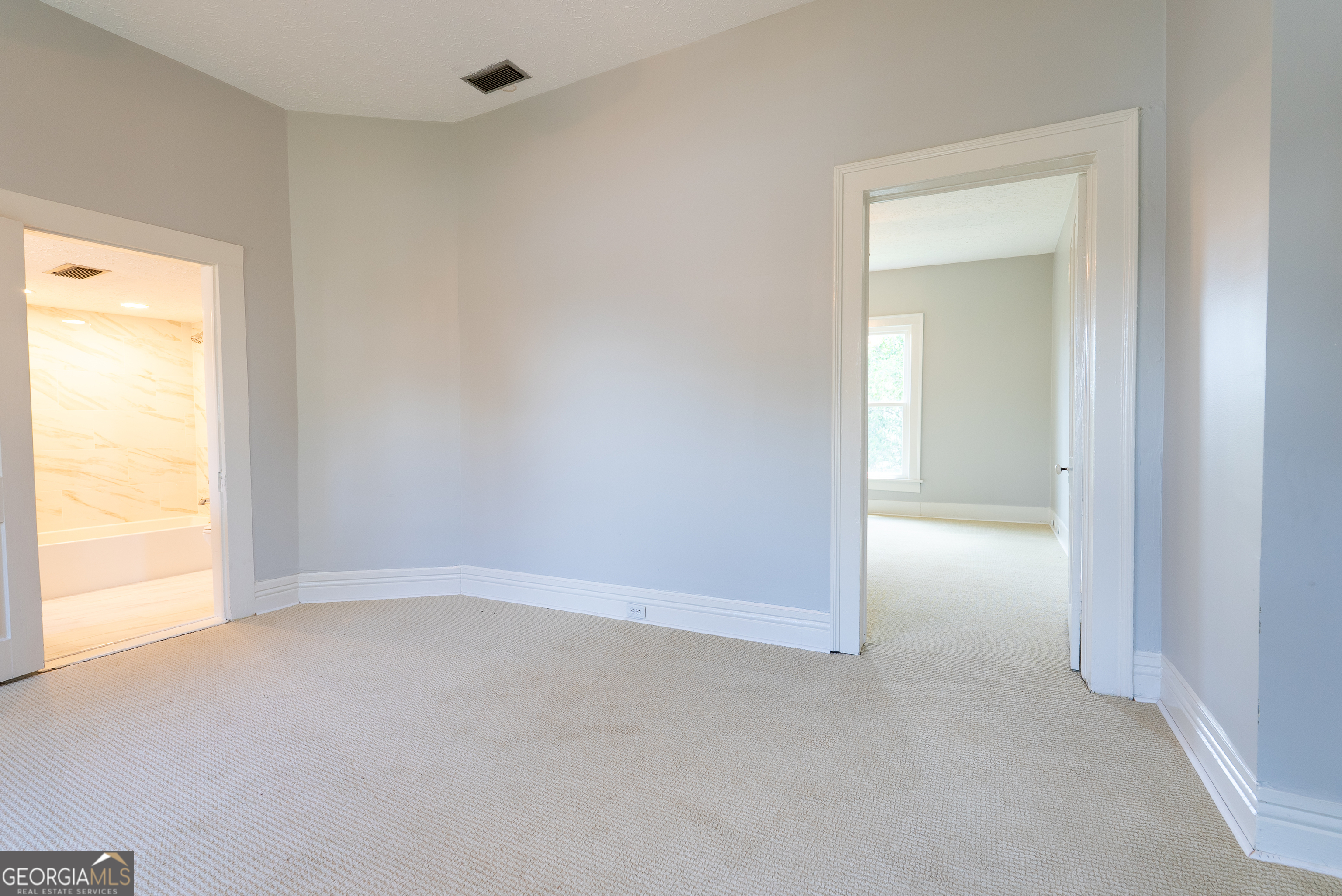 212 Hand Avenue West Pelham, GA 31779 - Photo 22 of 81 a view of an empty room and a window