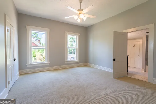 a kitchen with a sink and a window