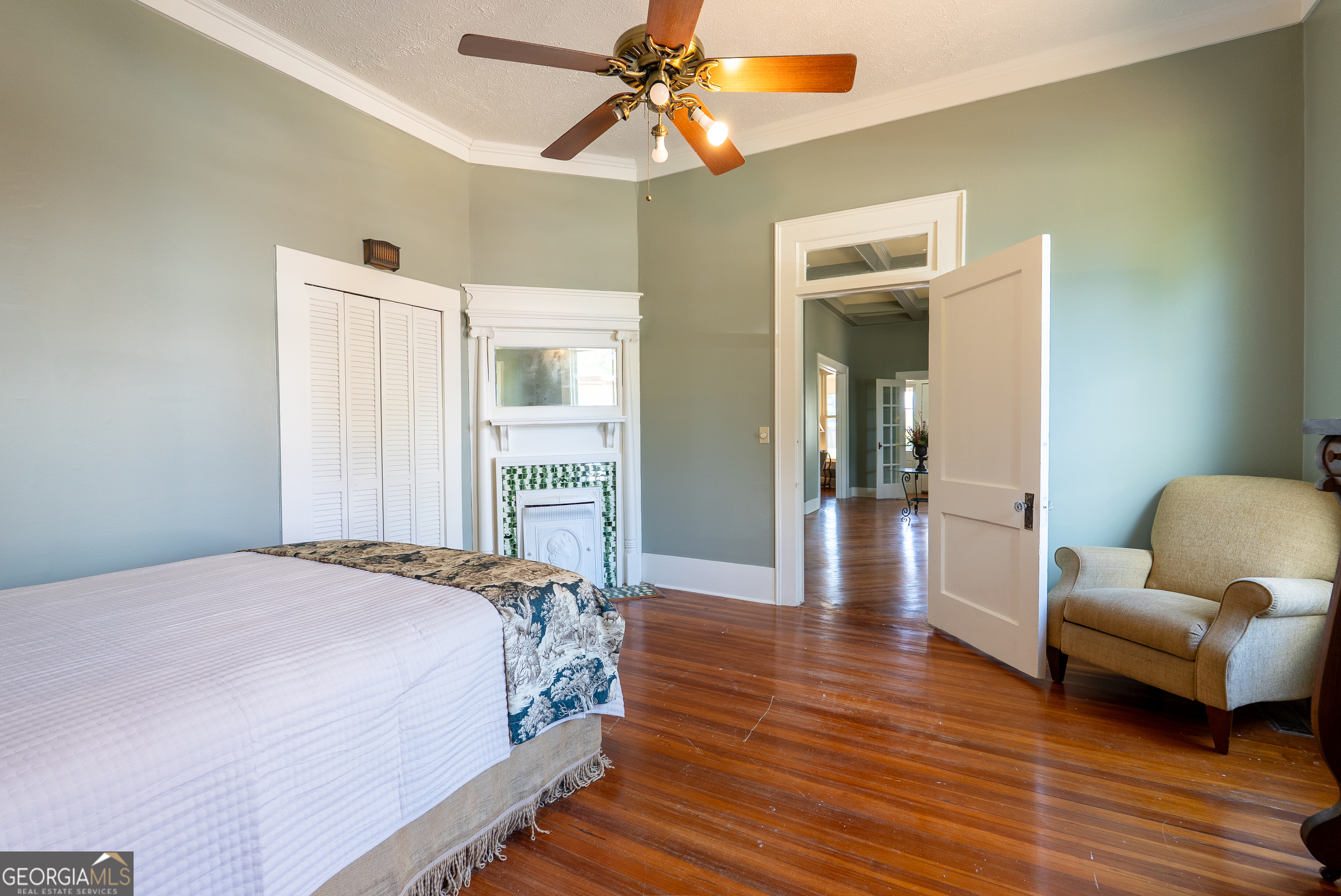 212 Hand Avenue West Pelham, GA 31779 - Photo 46 of 81 a bedroom with bed and wooden floor