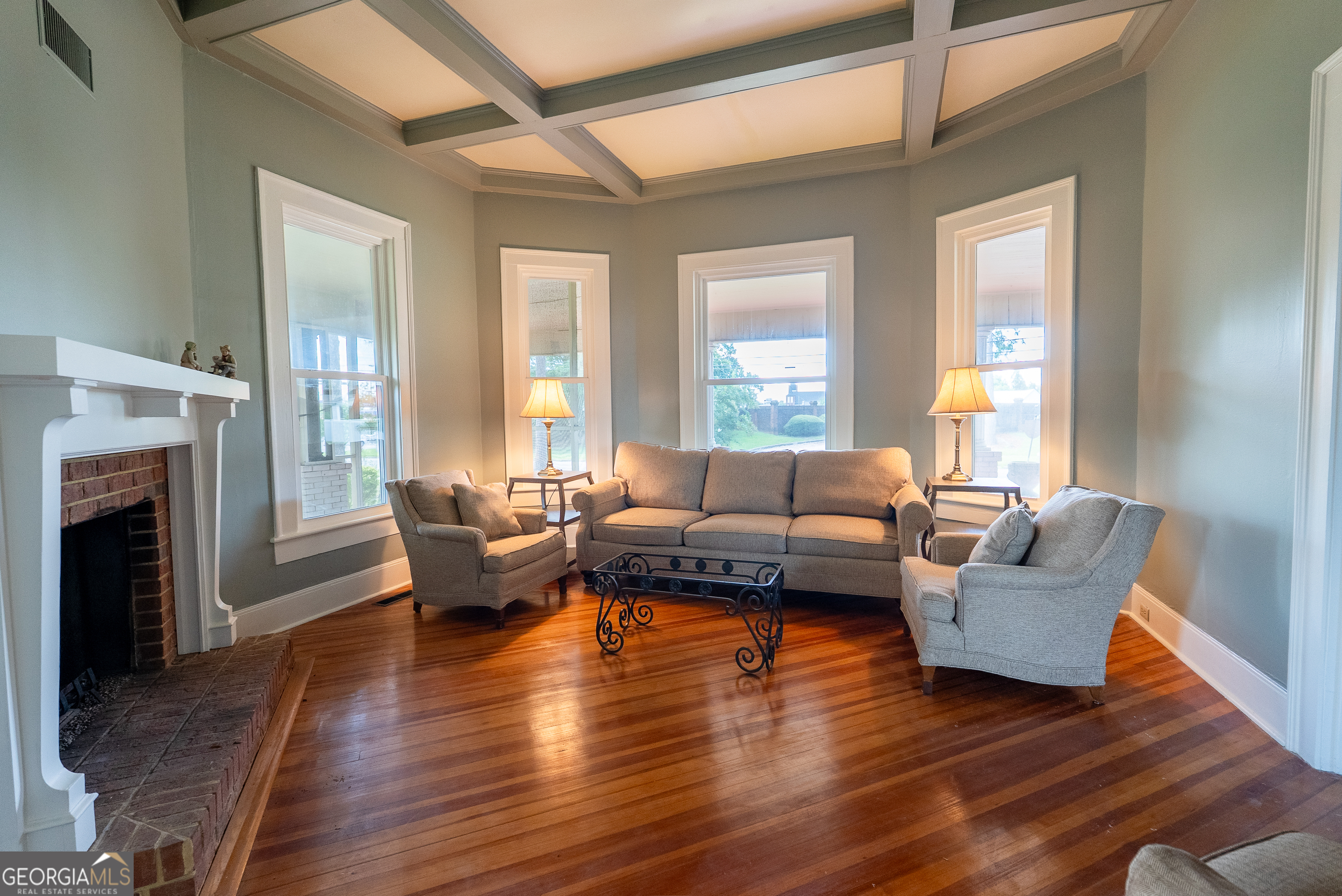 212 Hand Avenue West Pelham, GA 31779 - Photo 53 of 81 a living room with furniture and a fireplace