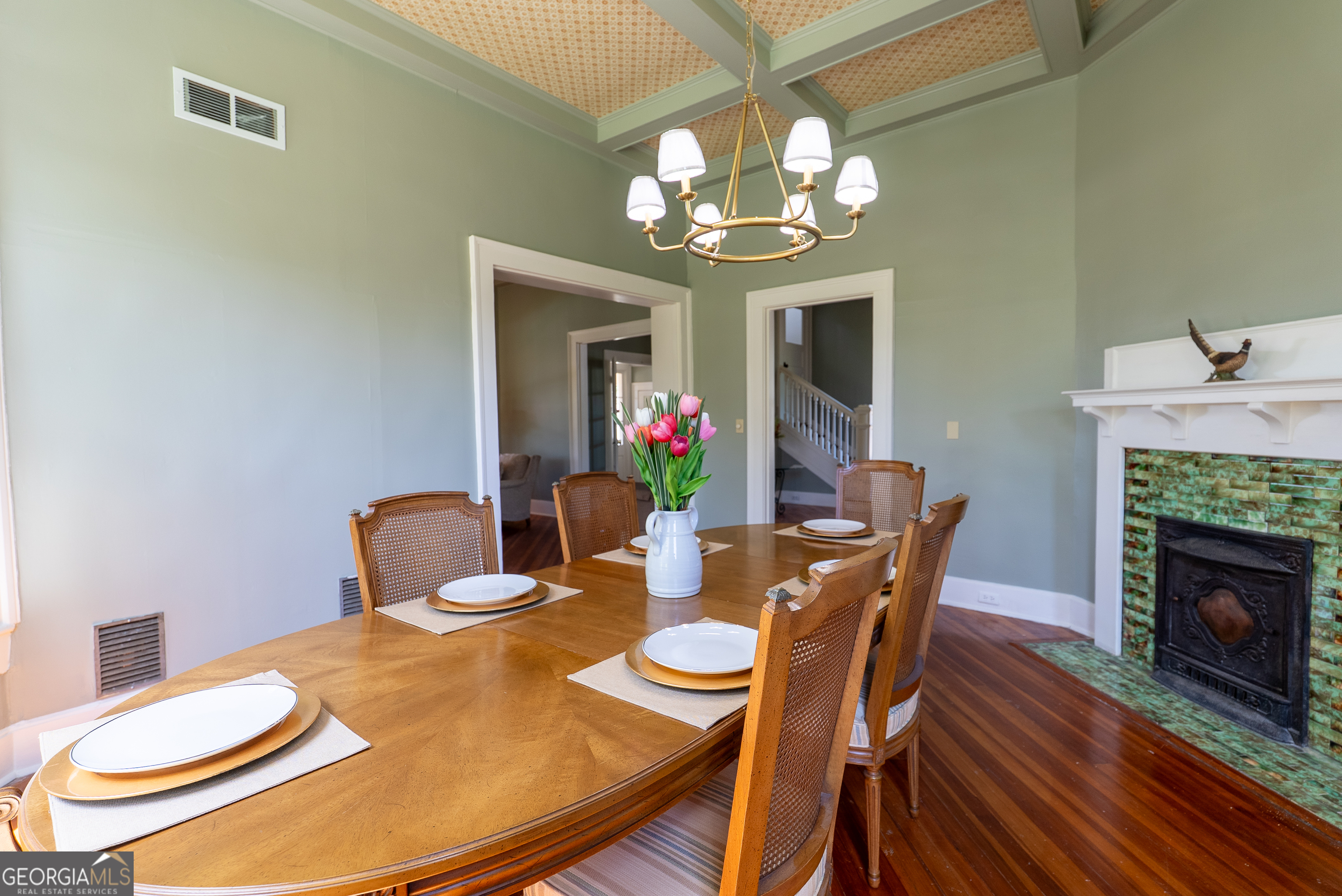 212 Hand Avenue West Pelham, GA 31779 - Photo 55 of 81 a view of a dining room with furniture a chandelier and wooden floor