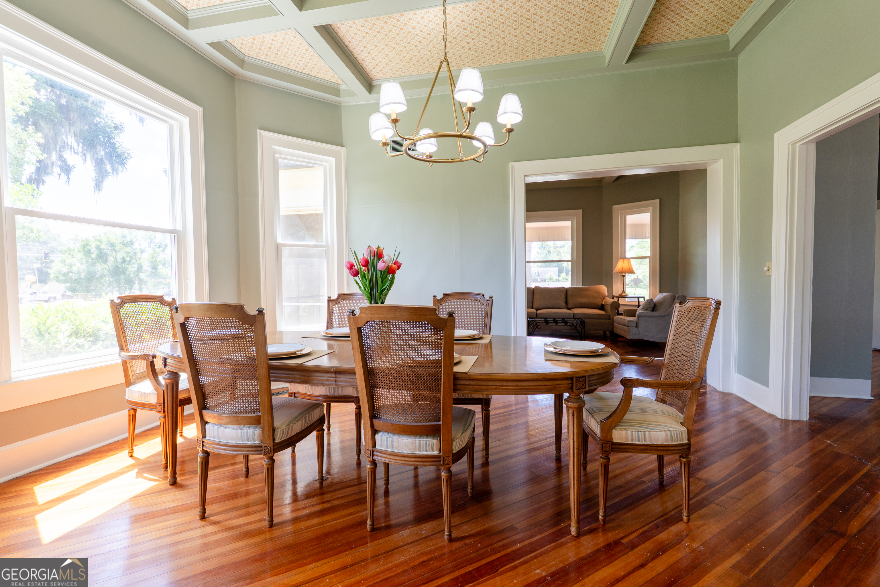 212 Hand Avenue West Pelham, GA 31779 - Photo 56 of 81 a view of a dining room with furniture a chandelier and wooden floor