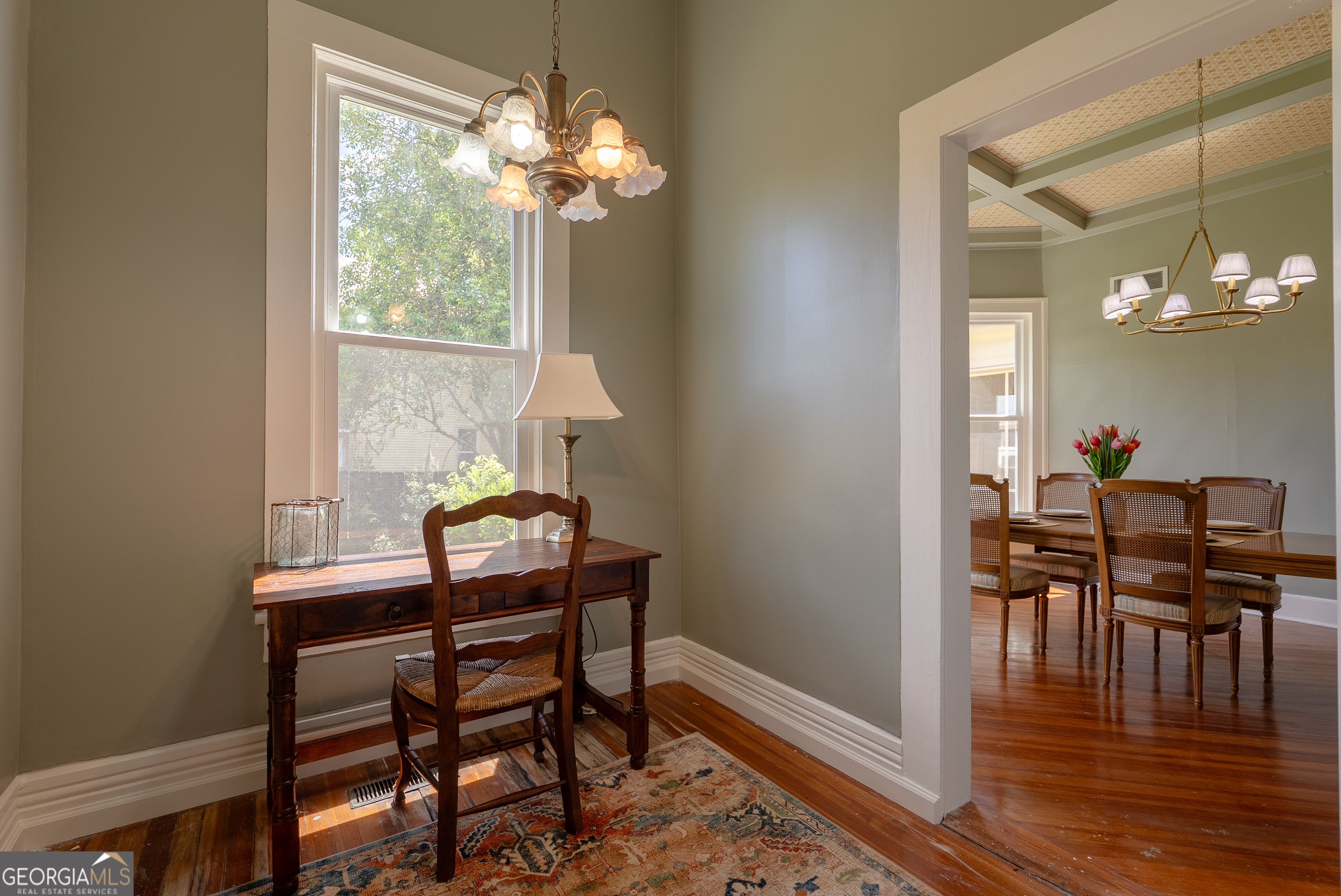 212 Hand Avenue West Pelham, GA 31779 - Photo 57 of 81 a dining room with furniture and wooden floor