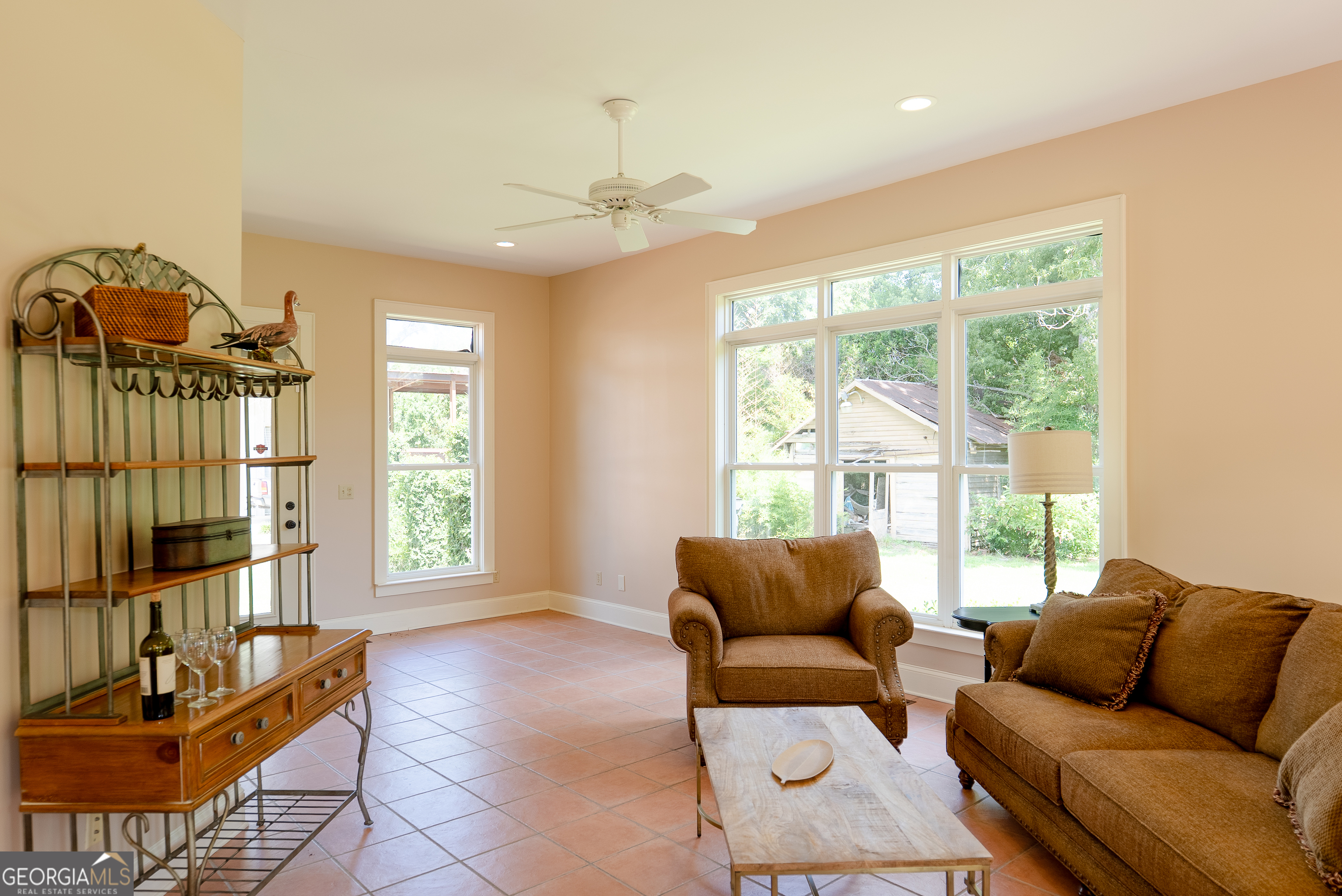 212 Hand Avenue West Pelham, GA 31779 - Photo 69 of 81 a living room with furniture and a large window