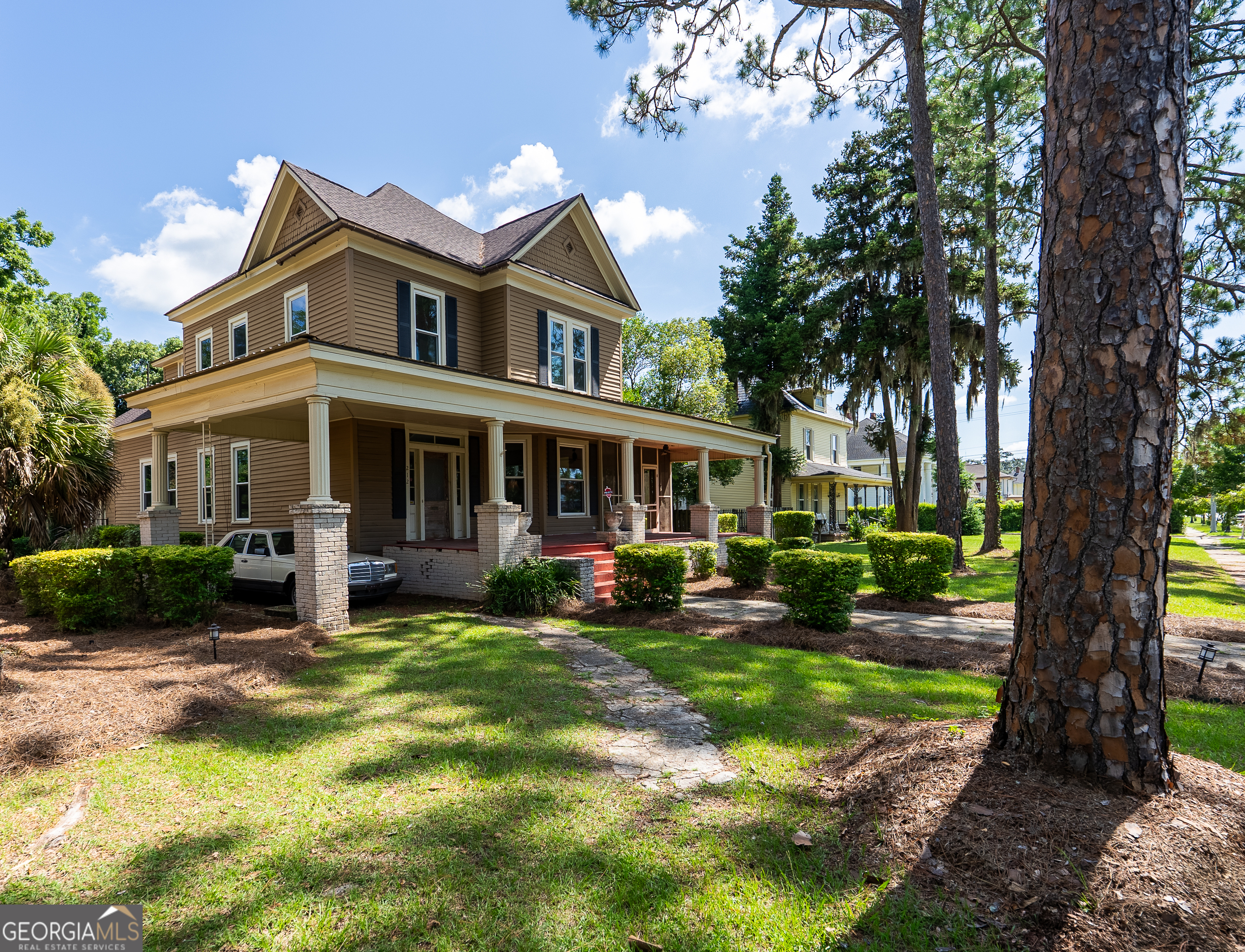 212 Hand Avenue West Pelham, GA 31779 - Photo 79 of 81 a view of a house with a yard porch and sitting area