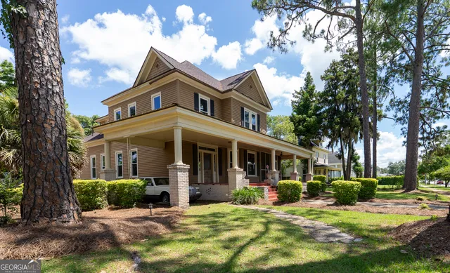 a view of a livingroom with wooden floor