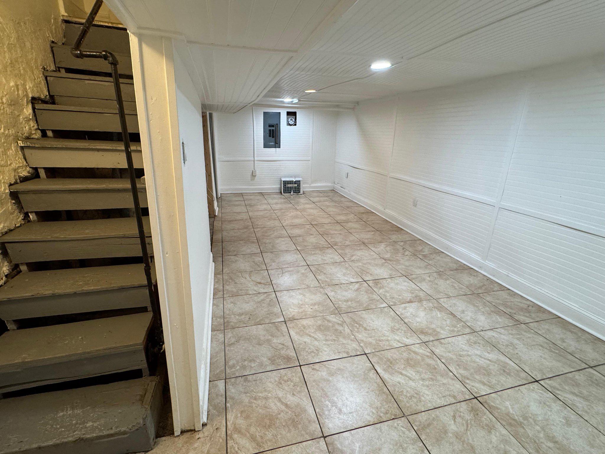 707 Denison Street Baltimore, MD 21229 - Photo 11 of 18 BSM Spacious, versatile basement retreat.