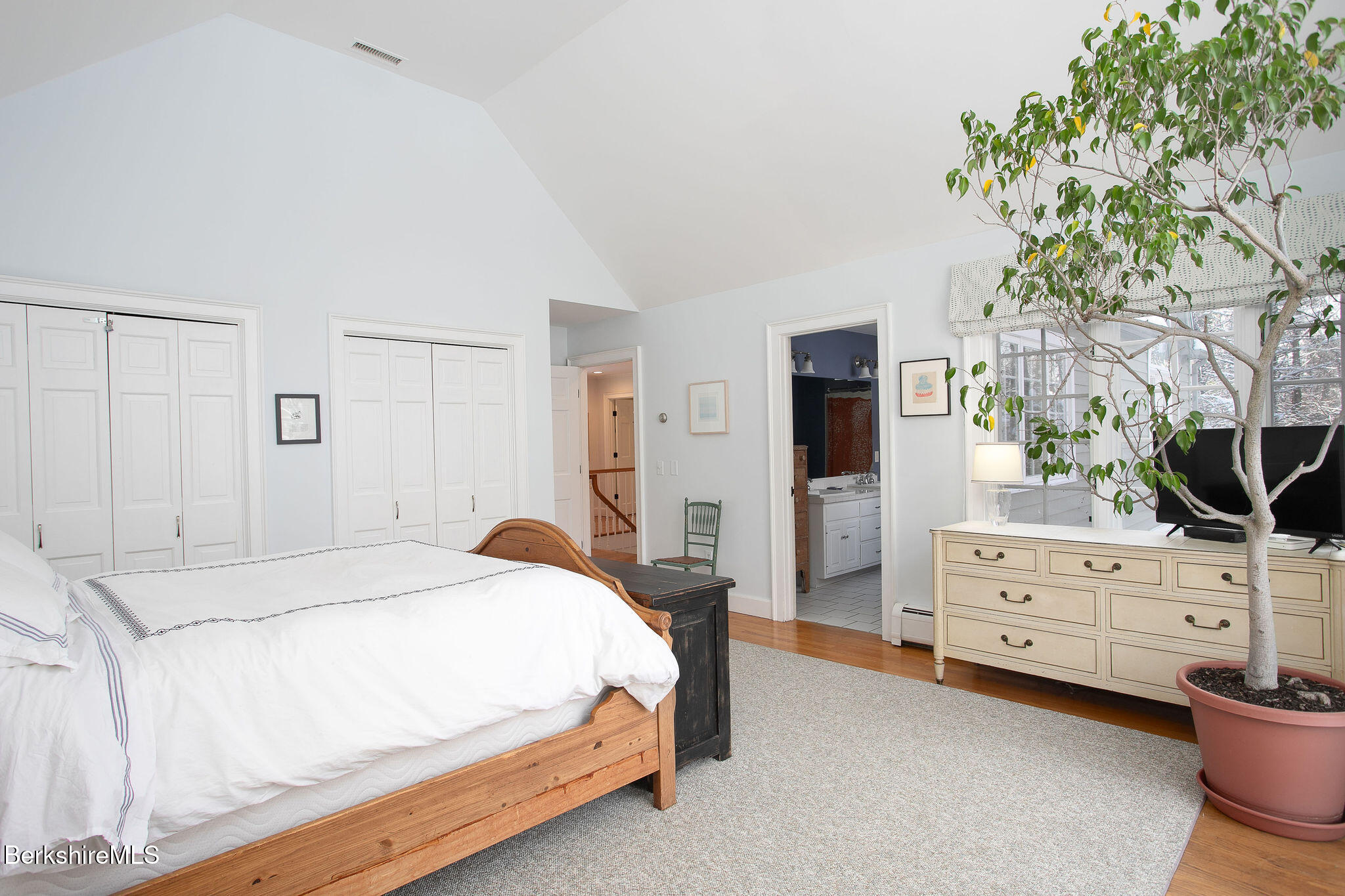 14 Old Tree Farm Road Stockbridge, MA 01266 - Photo 28 of 56 a spacious bedroom with a bed and a dresser