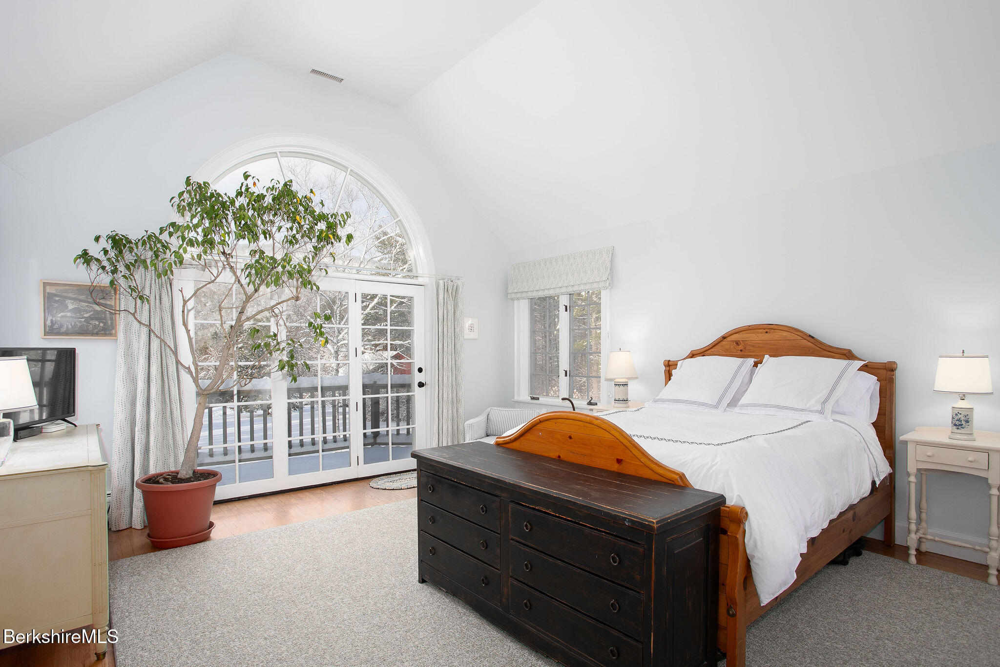 14 Old Tree Farm Road Stockbridge, MA 01266 - Photo 29 of 56 a bed sitting in a spacious bedroom next to a window