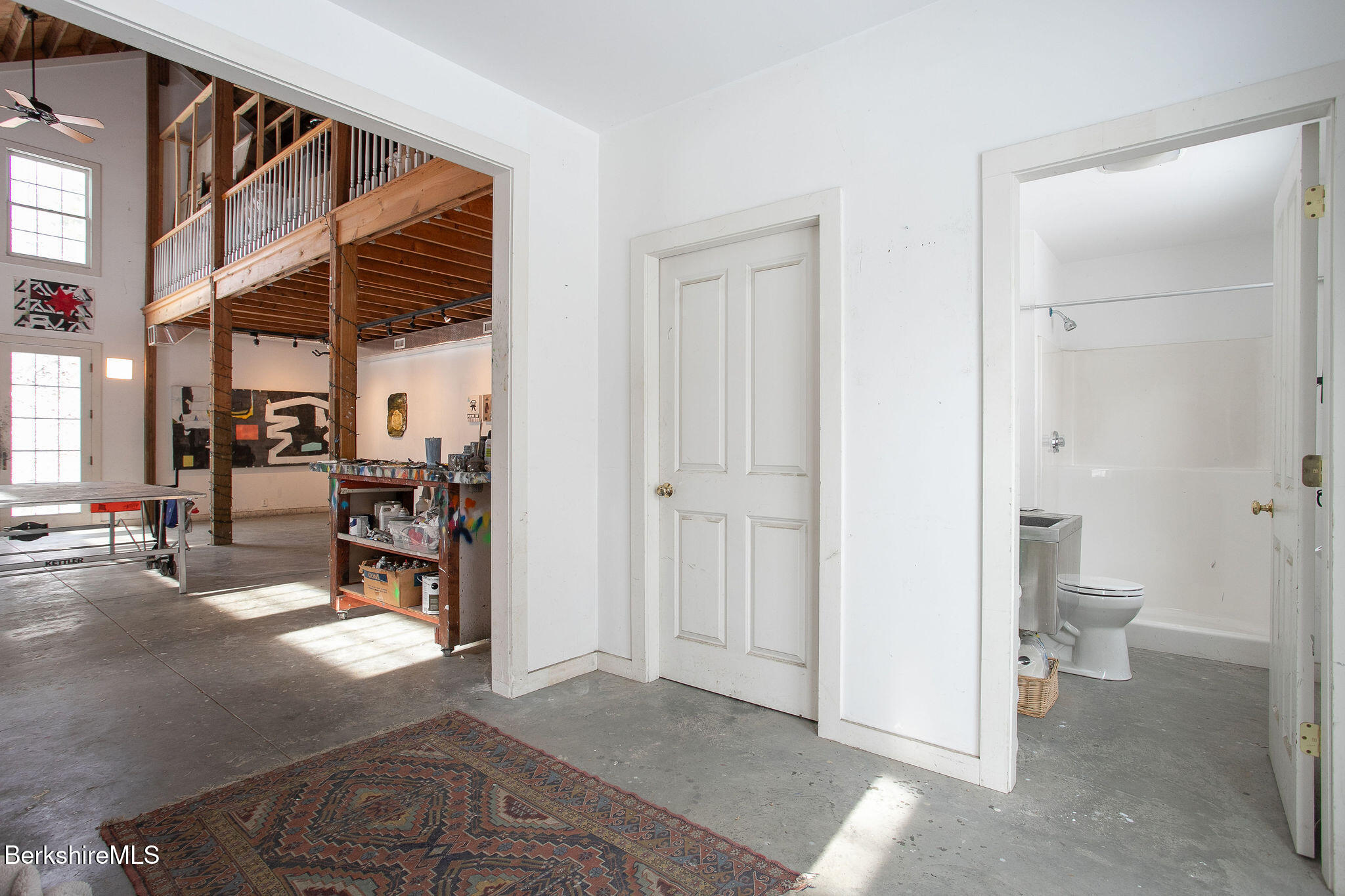 14 Old Tree Farm Road Stockbridge, MA 01266 - Photo 44 of 56 a view of a room with shelves