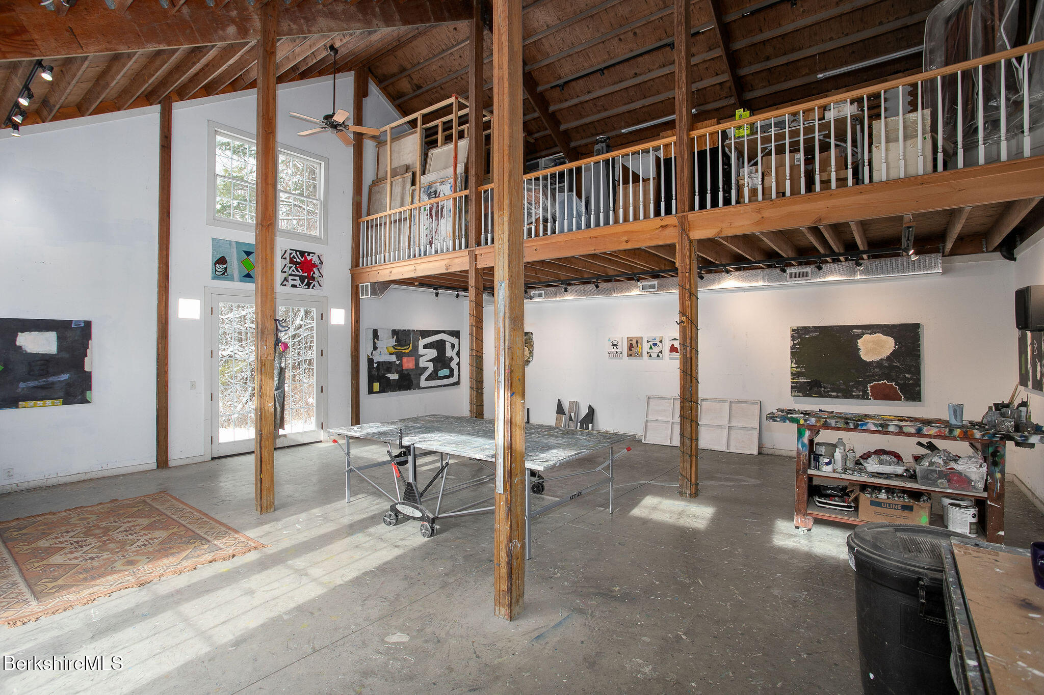 14 Old Tree Farm Road Stockbridge, MA 01266 - Photo 45 of 56 a view of a porch with a table and chairs