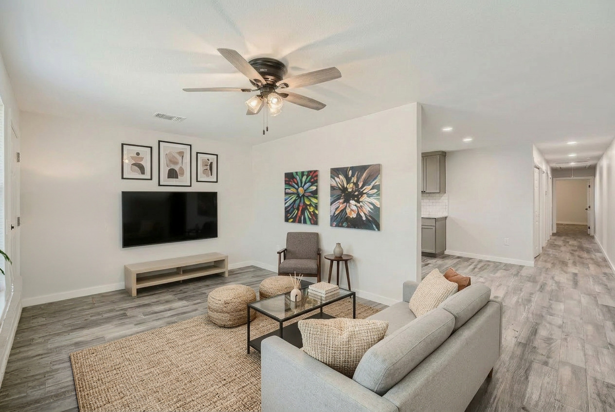 111 Fisher Street, Unit A & B Elgin, TX 78621 - Photo 6 of 13 a living room with furniture and a flat screen tv