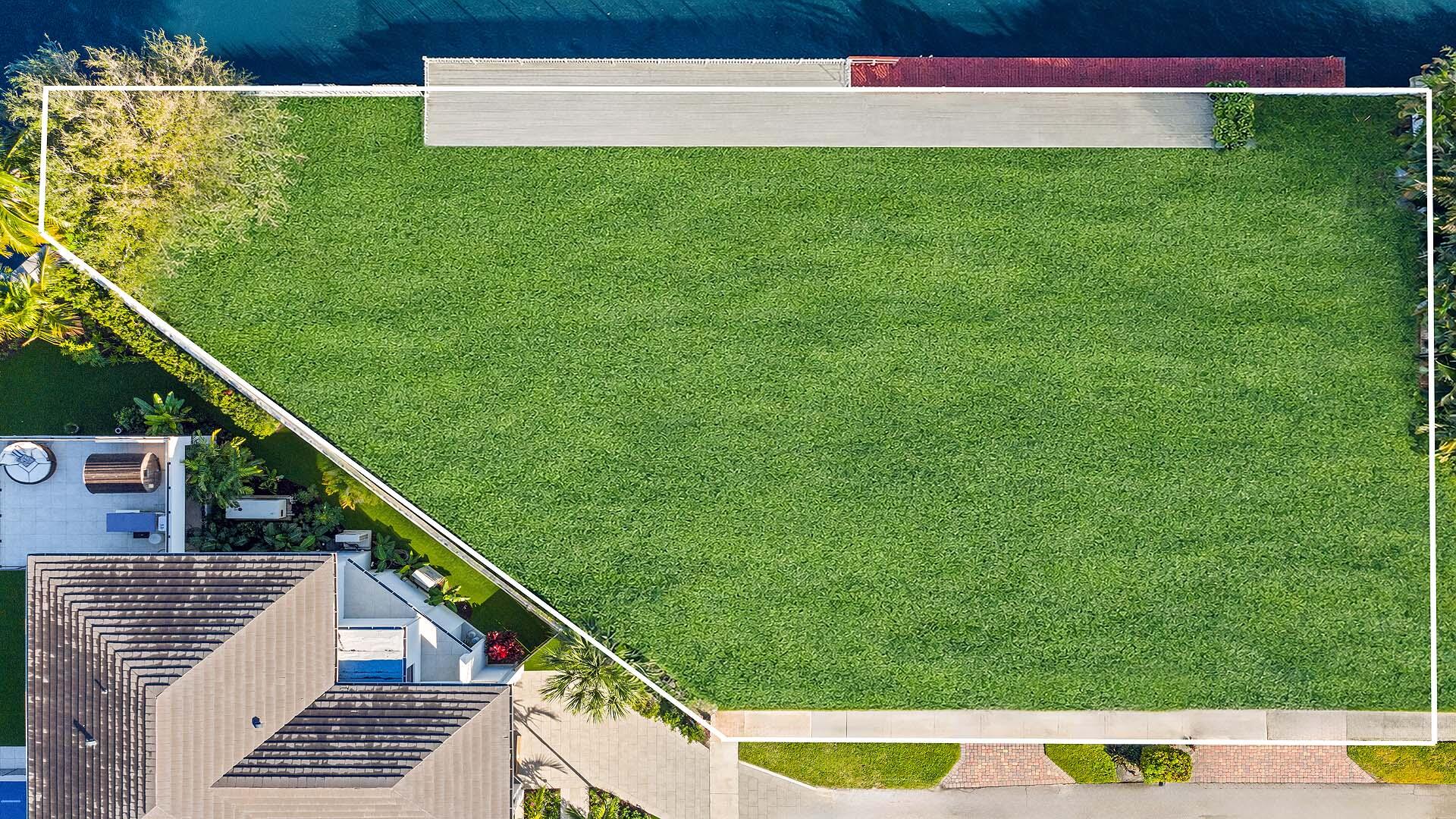 7401 Northeast Bay Cove Court Boca Raton, FL 33487 - Photo 8 of 11 a view of an outdoor space and deck