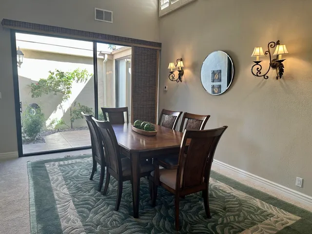 a kitchen with a stove a sink and a refrigerator
