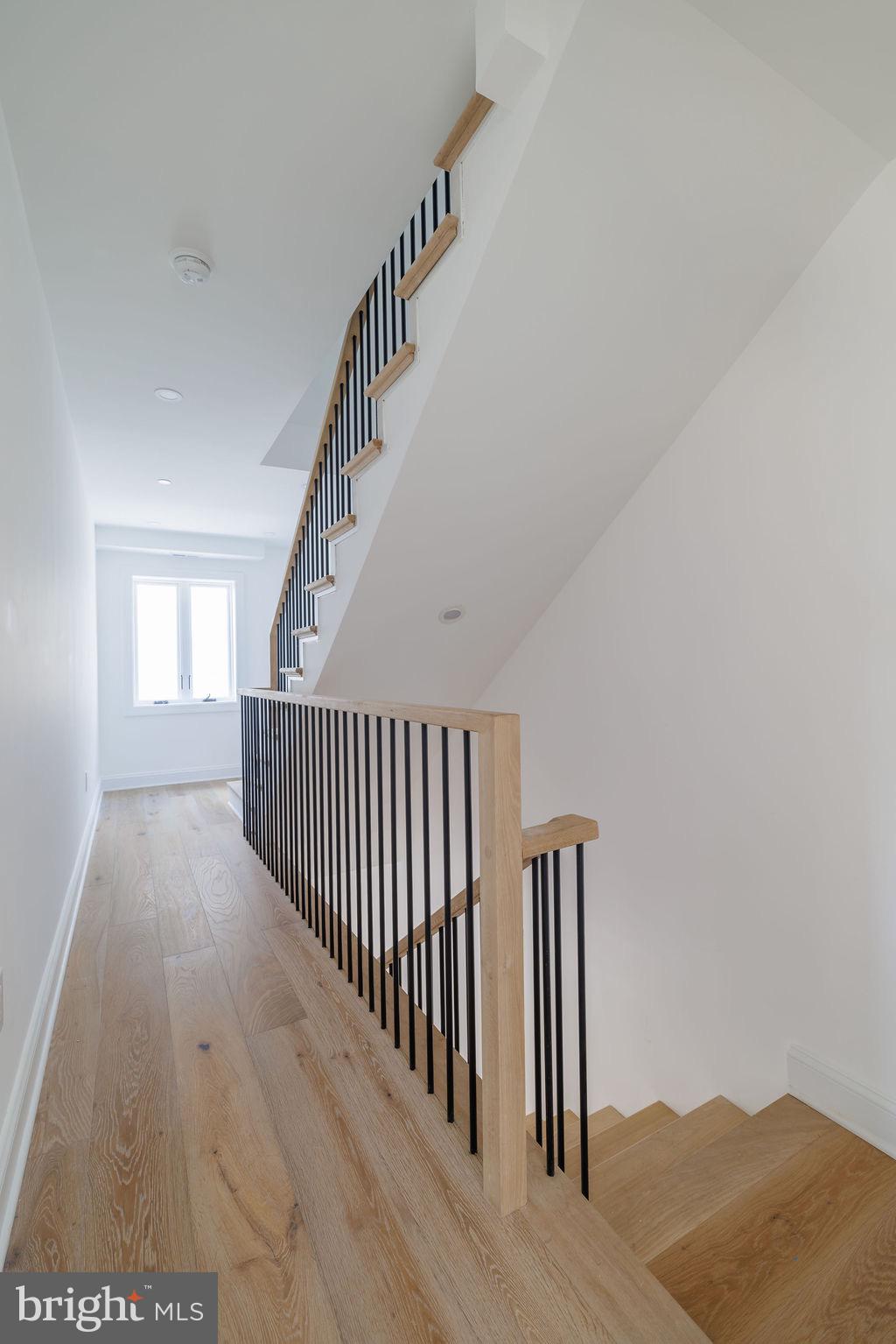 1200 Potomac Street Northwest Washington, DC 20007 - Photo 26 of 37 a view of staircase with railing and a rug