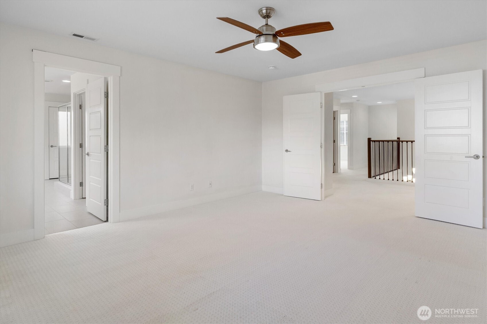 8711 27th Street East Edgewood, WA 98371 - Photo 22 of 40 a view of a livingroom with a ceiling fan