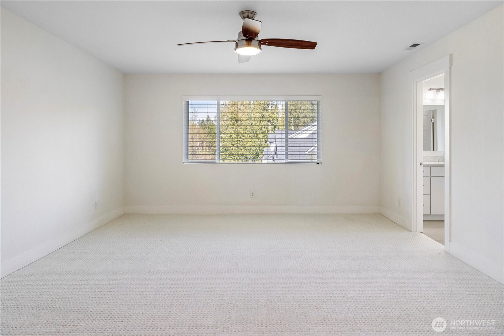 8711 27th Street East Edgewood, WA 98371 - Photo 23 of 40 an empty room with windows