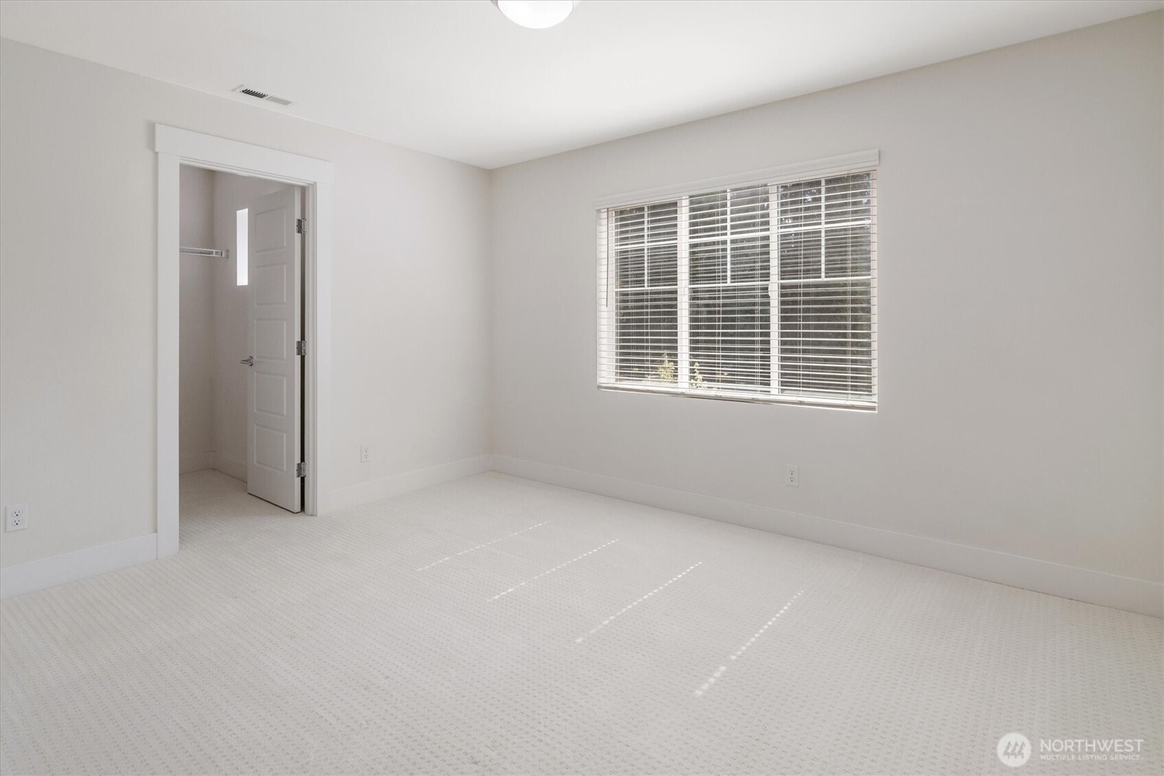 8711 27th Street East Edgewood, WA 98371 - Photo 27 of 40 an empty room with a window