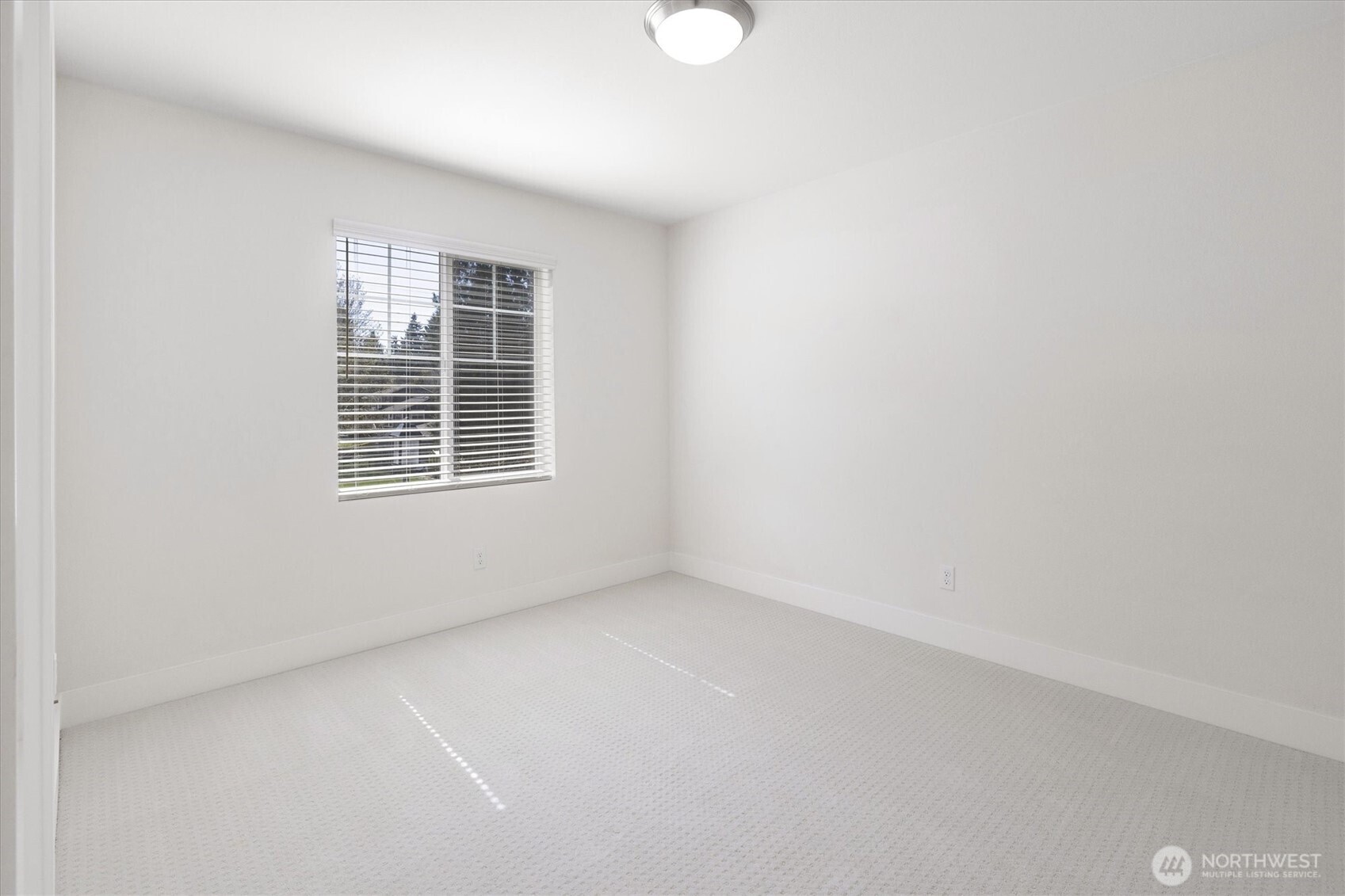 8711 27th Street East Edgewood, WA 98371 - Photo 28 of 40 an empty room with windows