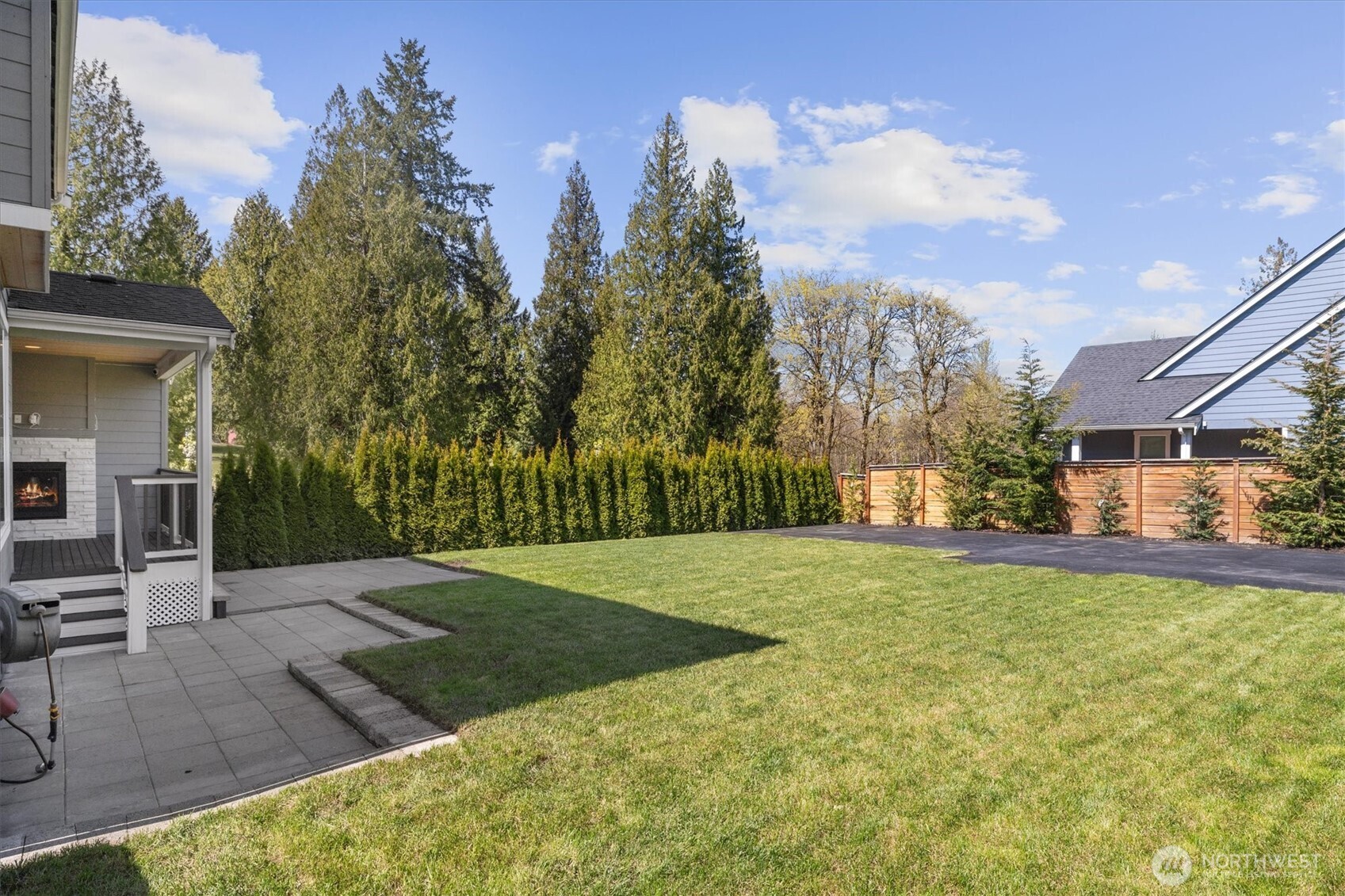 8711 27th Street East Edgewood, WA 98371 - Photo 32 of 40 a view of a backyard of the house