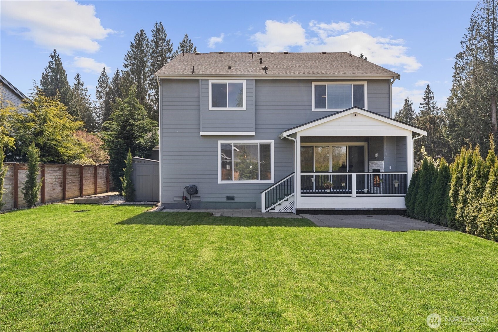 8711 27th Street East Edgewood, WA 98371 - Photo 34 of 40 a front view of a house with a yard
