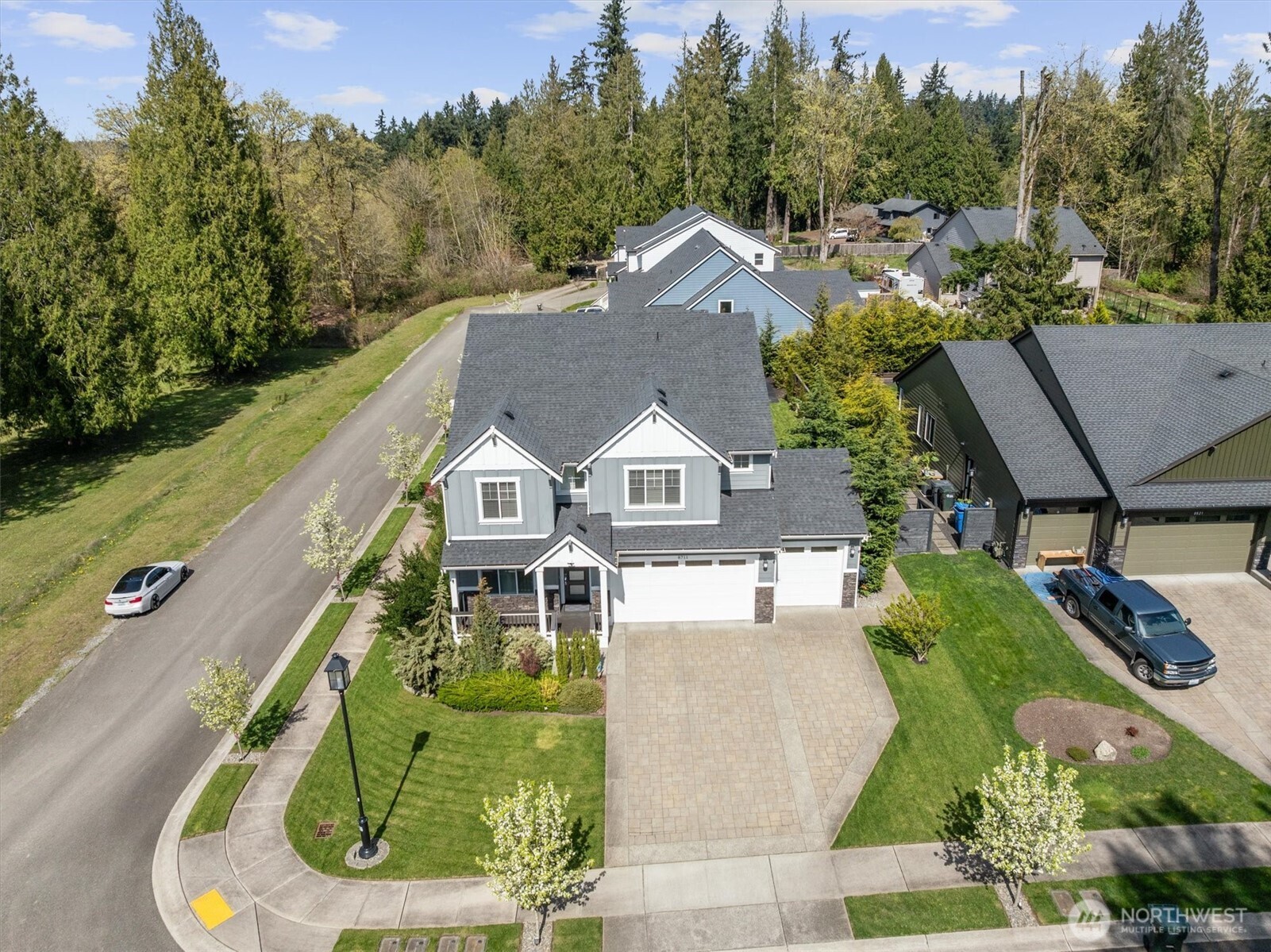 8711 27th Street East Edgewood, WA 98371 - Photo 35 of 40 an aerial view of a house with a garden