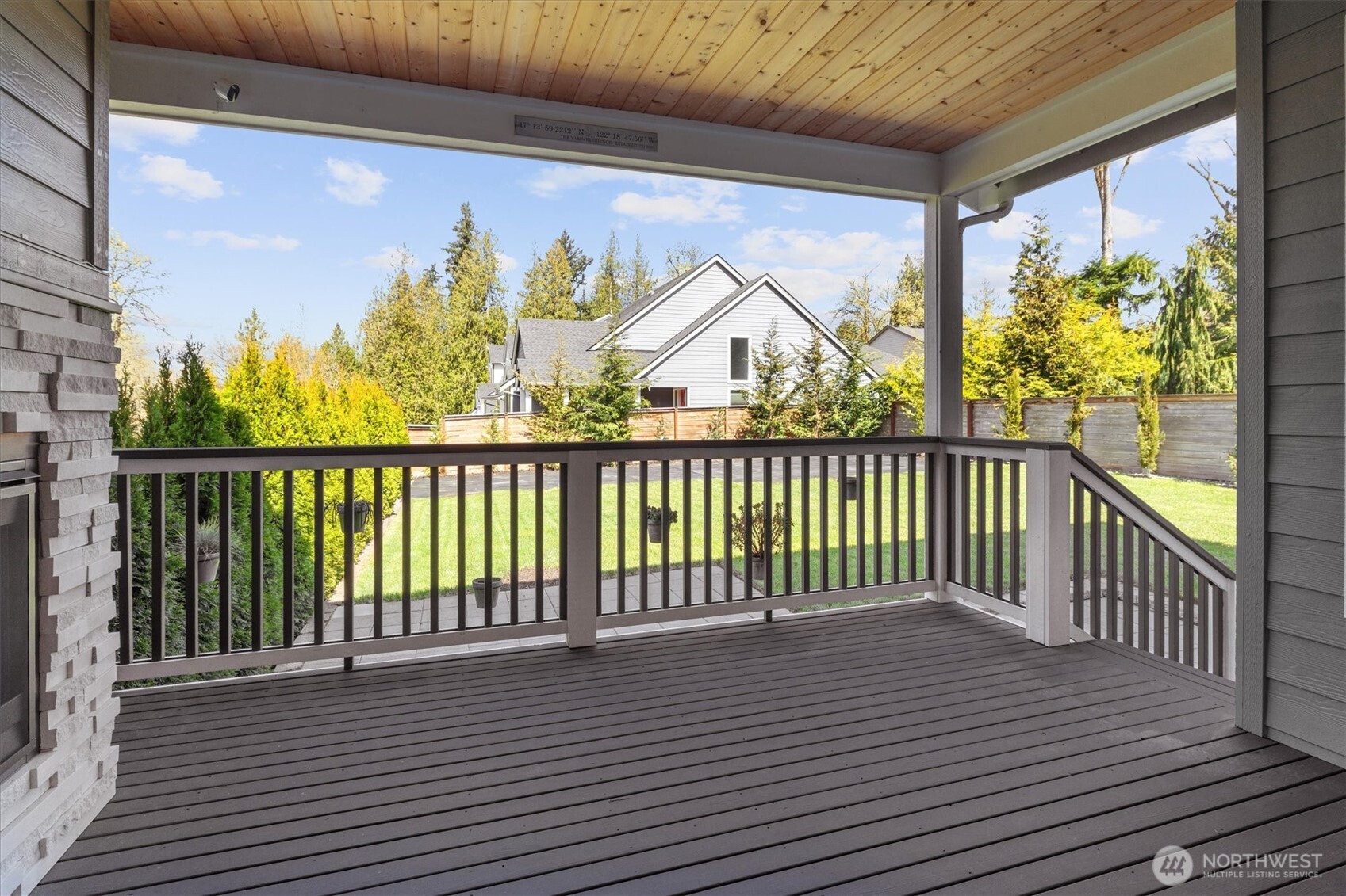 8711 27th Street East Edgewood, WA 98371 - Photo 9 of 40 a view of a balcony with wooden floor