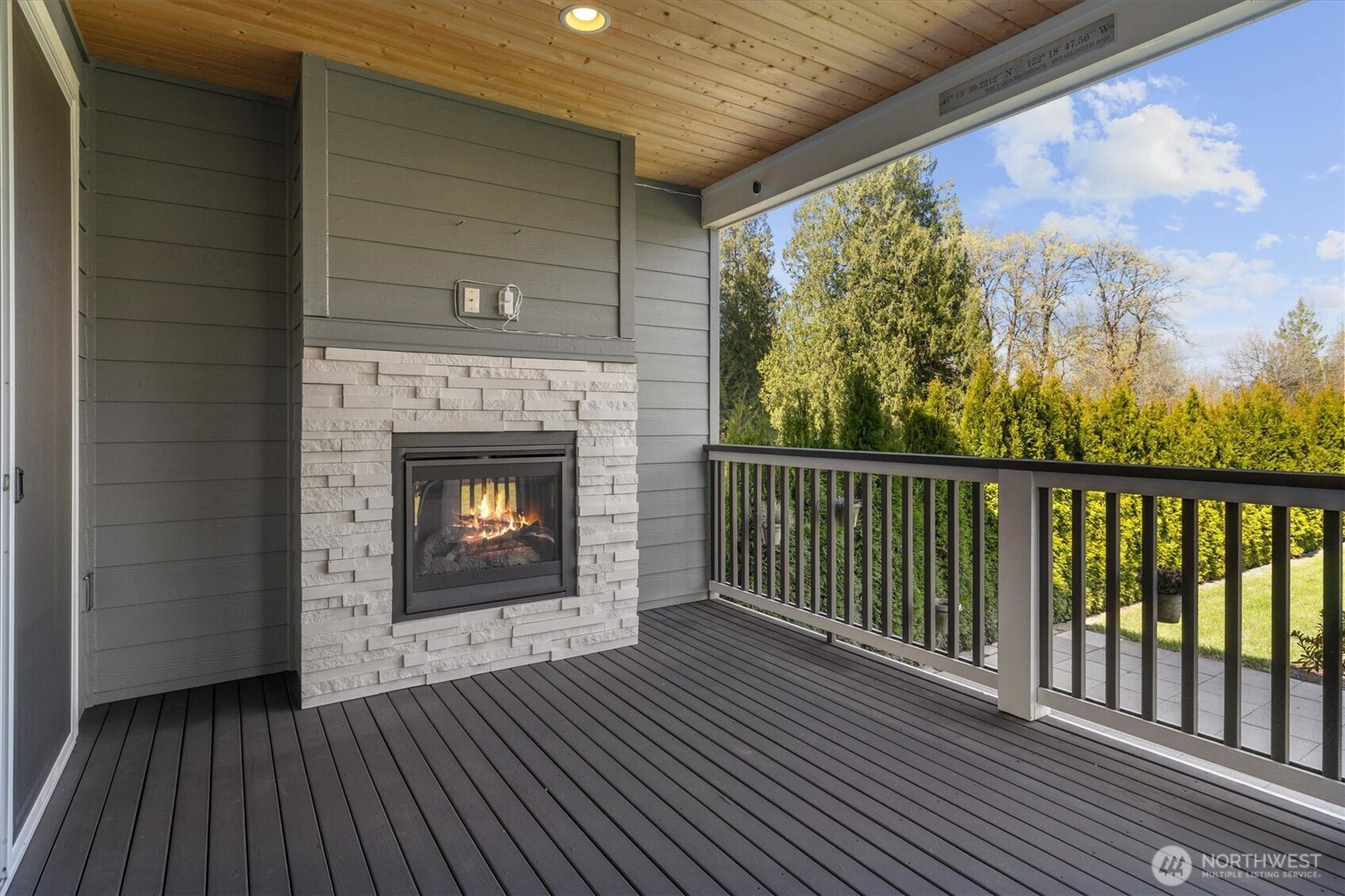 8711 27th Street East Edgewood, WA 98371 - Photo 10 of 40 a view of a balcony with a fireplace