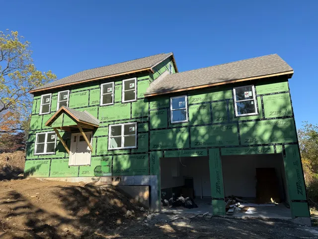 a front view of a house with a porch