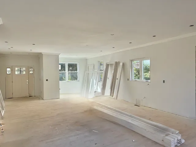a view of livingroom with hardwood floor and a ceiling fan