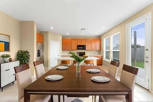 a view of a dining room with furniture
