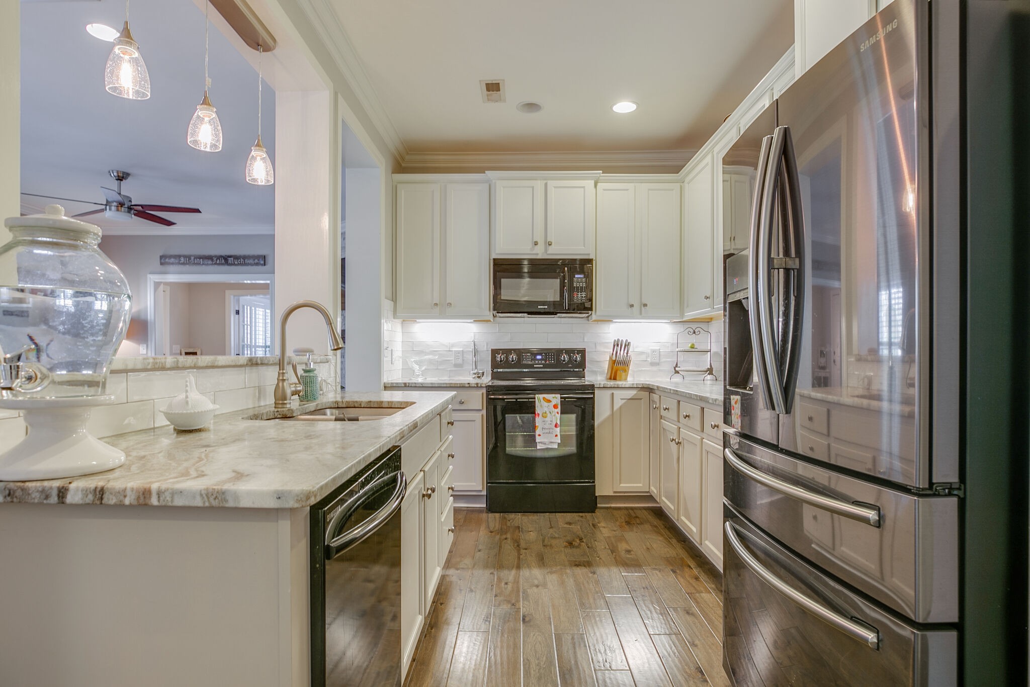 136 Ormesby Place Franklin, TN 37064 - Photo 18 of 41 a kitchen with a sink stove and refrigerator