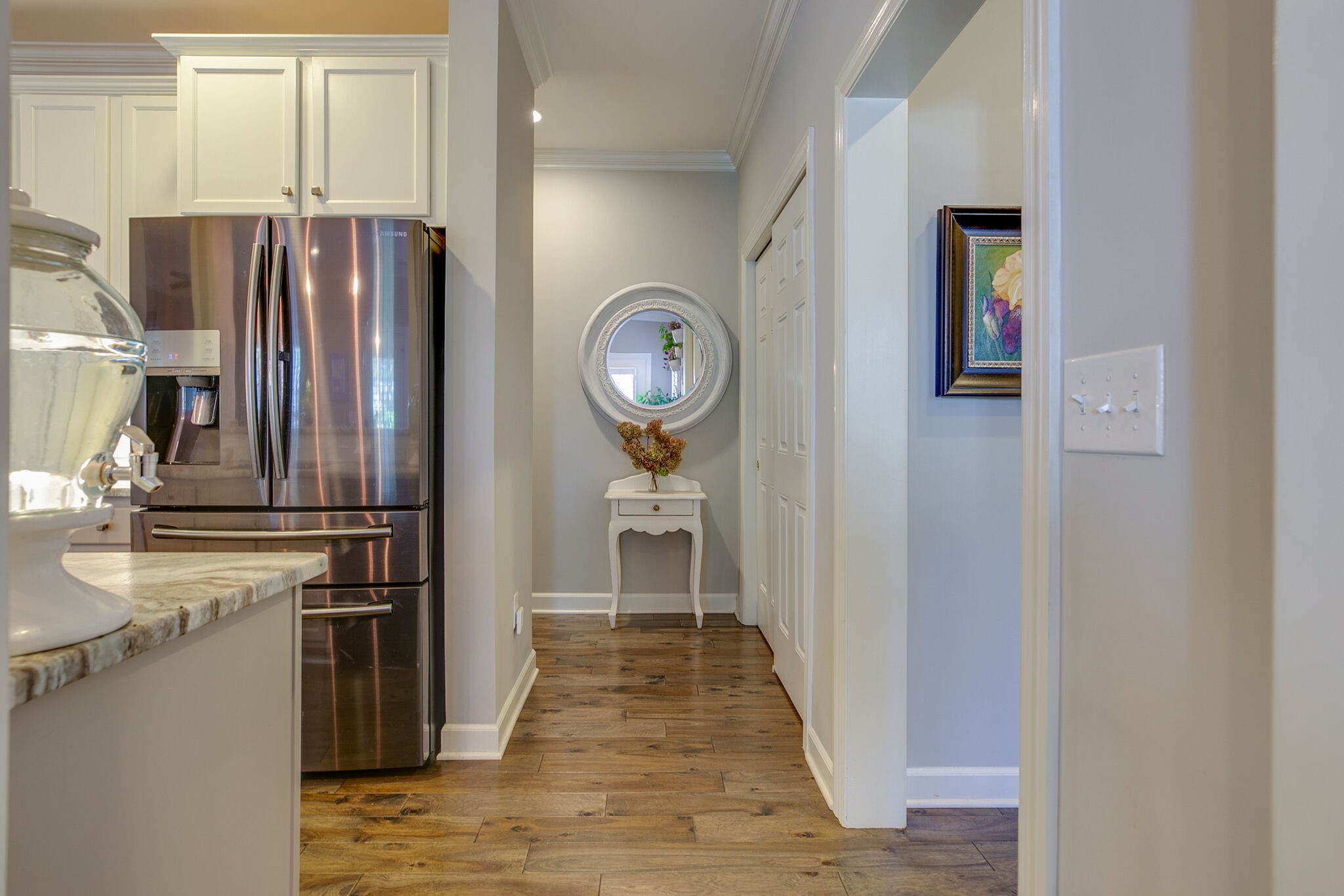 136 Ormesby Place Franklin, TN 37064 - Photo 23 of 41 a view of hallway with wooden floor