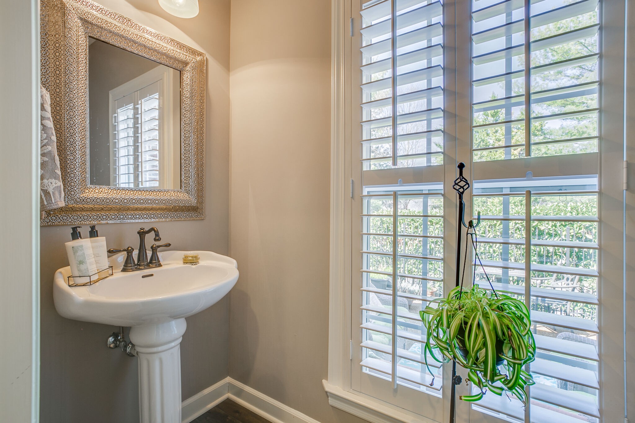 136 Ormesby Place Franklin, TN 37064 - Photo 25 of 41 a bathroom with a sink a mirror and a window